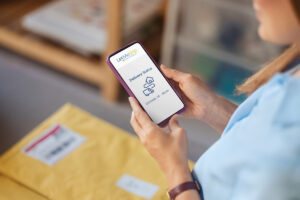 Customer checking order tracking status on a phone