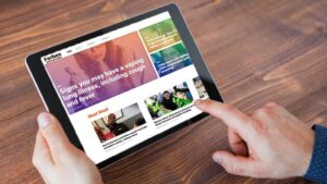 Person reading vaping news on a tablet